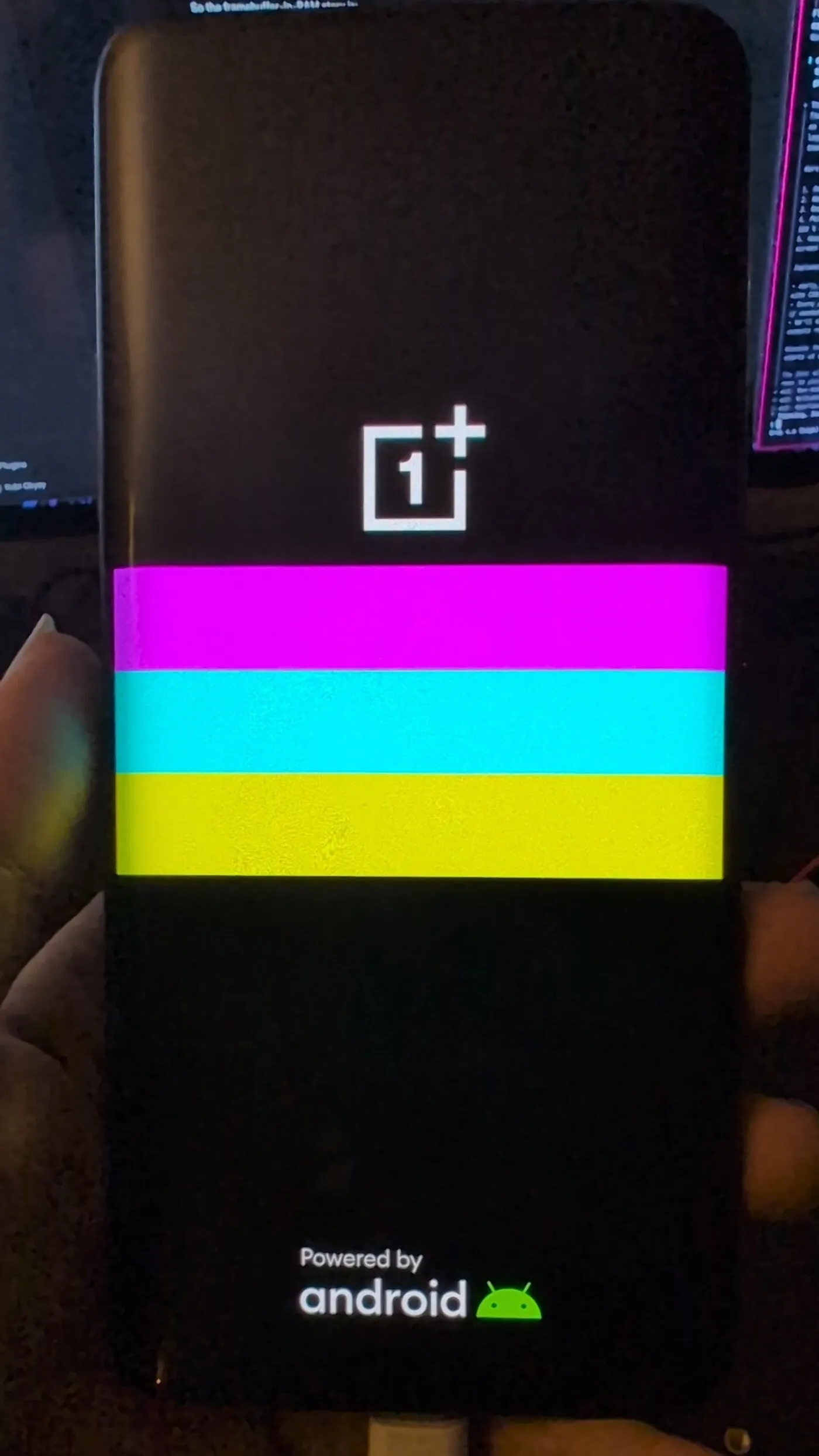 Early display bring-up with color test bars over the OnePlus boot logo